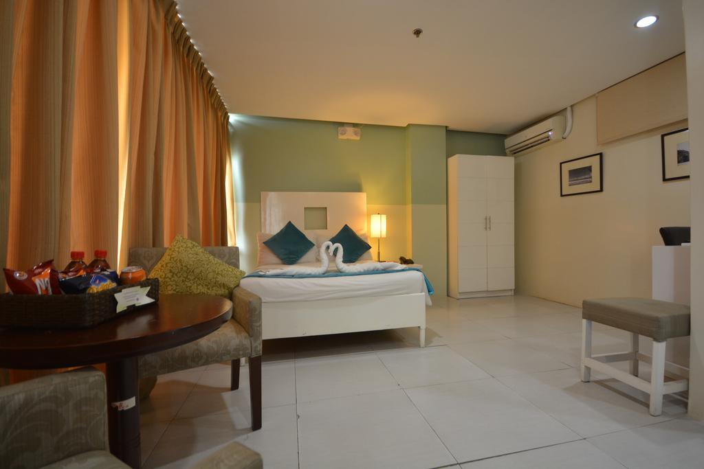 Empire Suites Hotel Puerto Princesa Exteriör bild